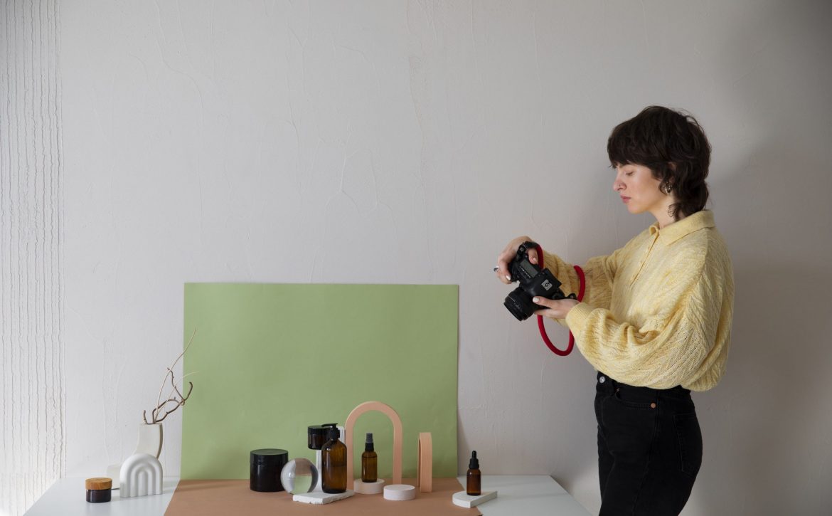 medium-shot-specialized-photographer-taking-photos (1)